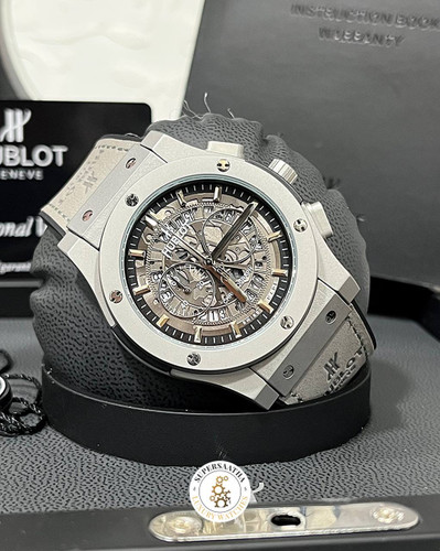 ساعت مردانه هوبلو HUBLOT کرنوگراف سه موتوره طوسی